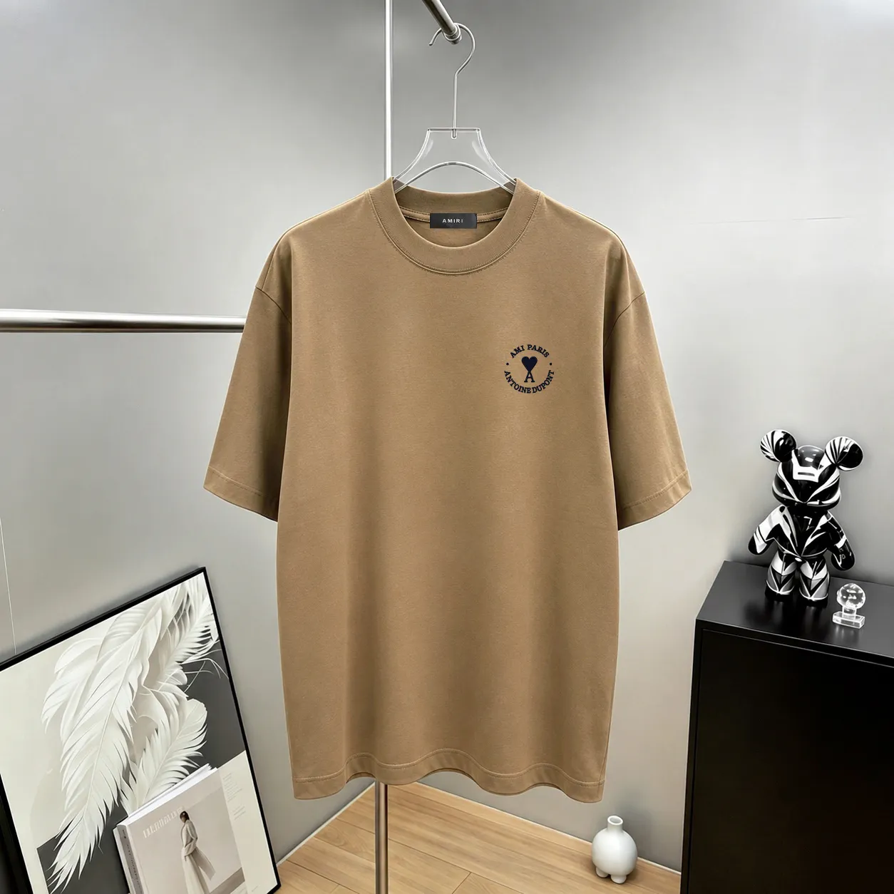 ami～ Embroidered heart-shaped Alogo design, "differentiation currency fabric" 7A antibacterial short-sleeved tee, the upper body is very comfortable, Same Style half-sleeves for men and women, dropped shoulders and loose fit Color: Black White Coffee Brown Size: S (90-130 pounds) M (125-150 pounds) L (135-165 pounds) XL (160-190 pounds) XXL (185-220 pounds)